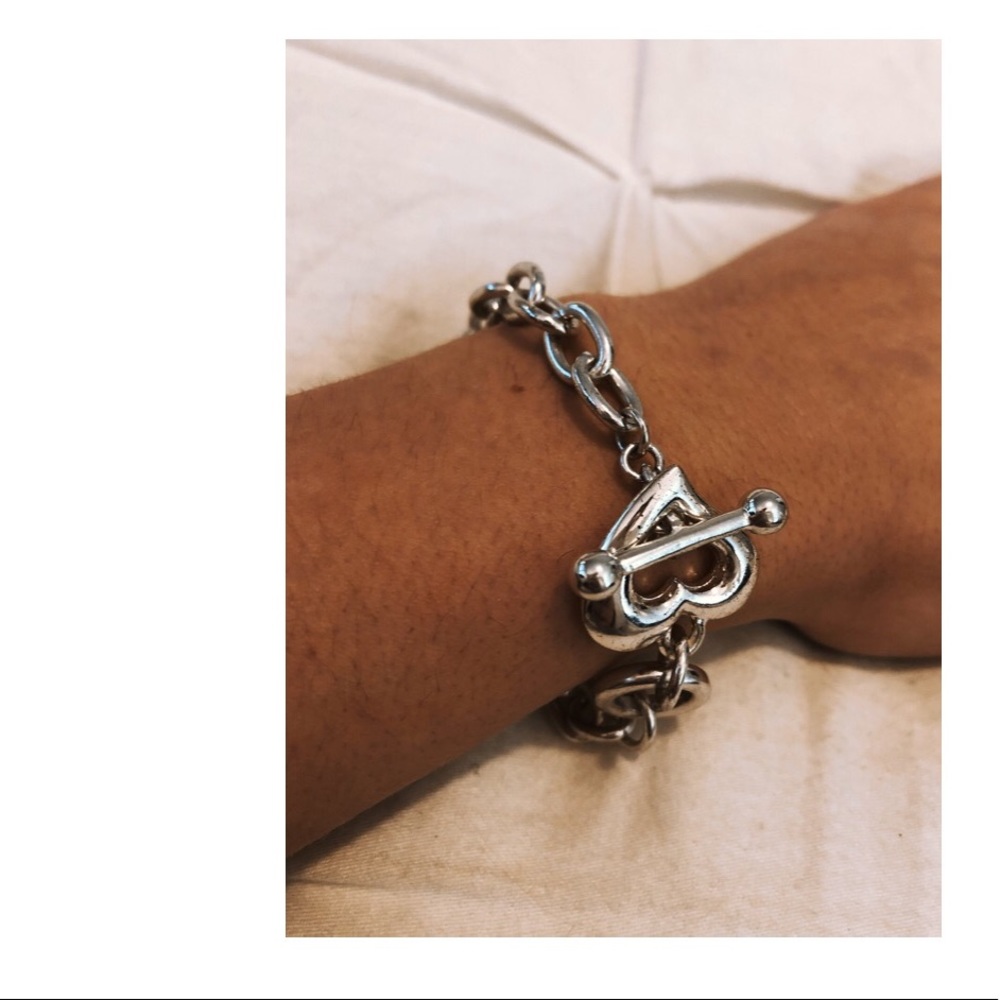 Silver colored heart chain-link bracelet